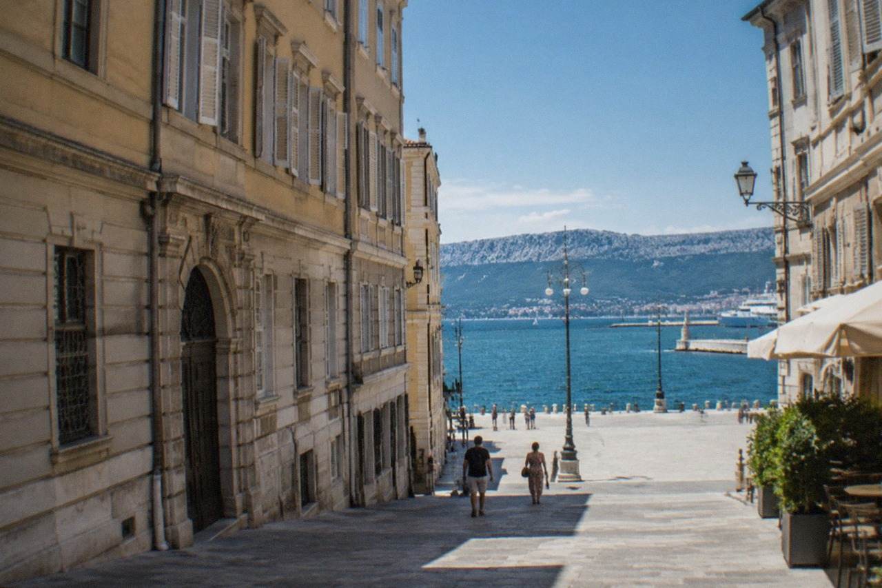 The Trieste seafront with the Adriatic Gulf and distant coastline seen from the city