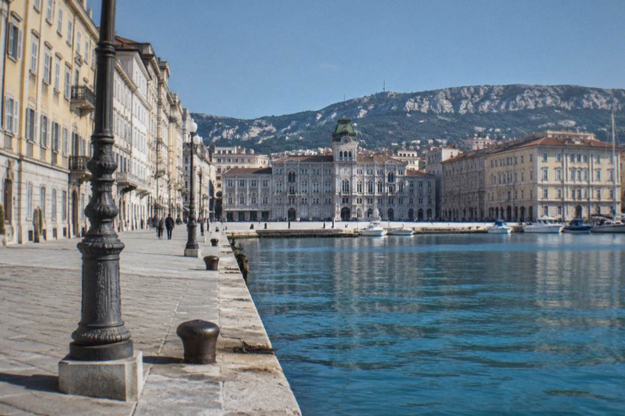 The seafront square of Trieste, Italy, with the historic buildings along the gulf in morning light