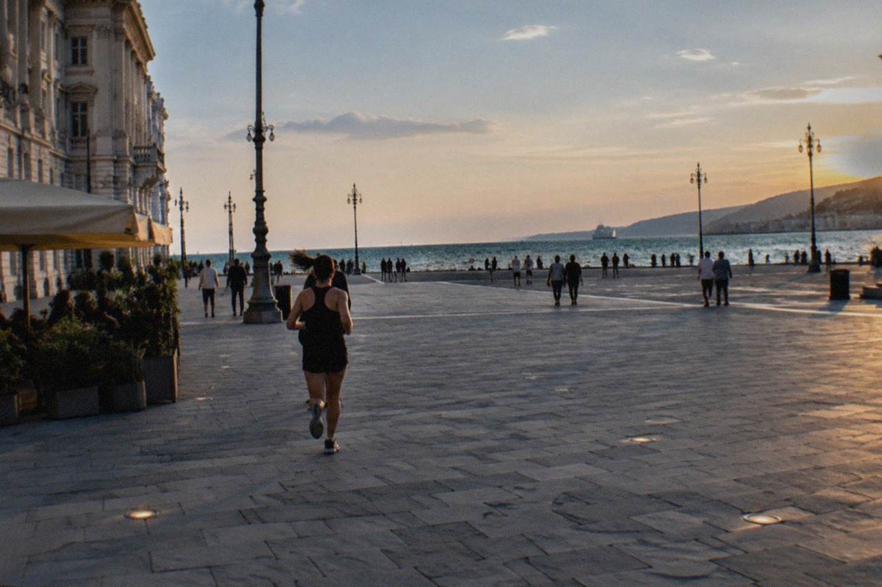The seafront of Trieste, Italy at dusk, with Piazza Unità d'Italia and the Gulf of Trieste in the background