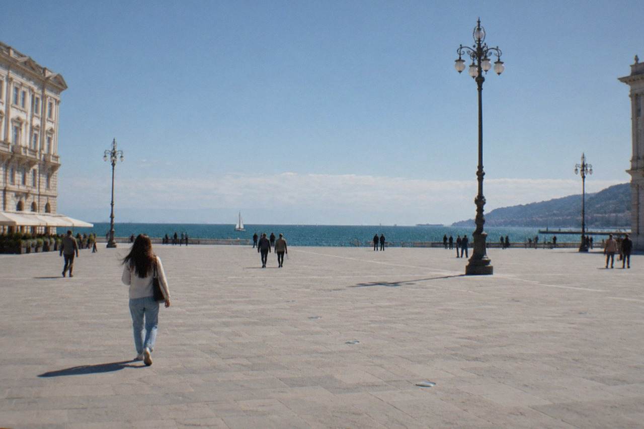 The seafront of Trieste, Italy, with the wide open square of Piazza Unità d'Italia facing the Adriatic on a clear morning