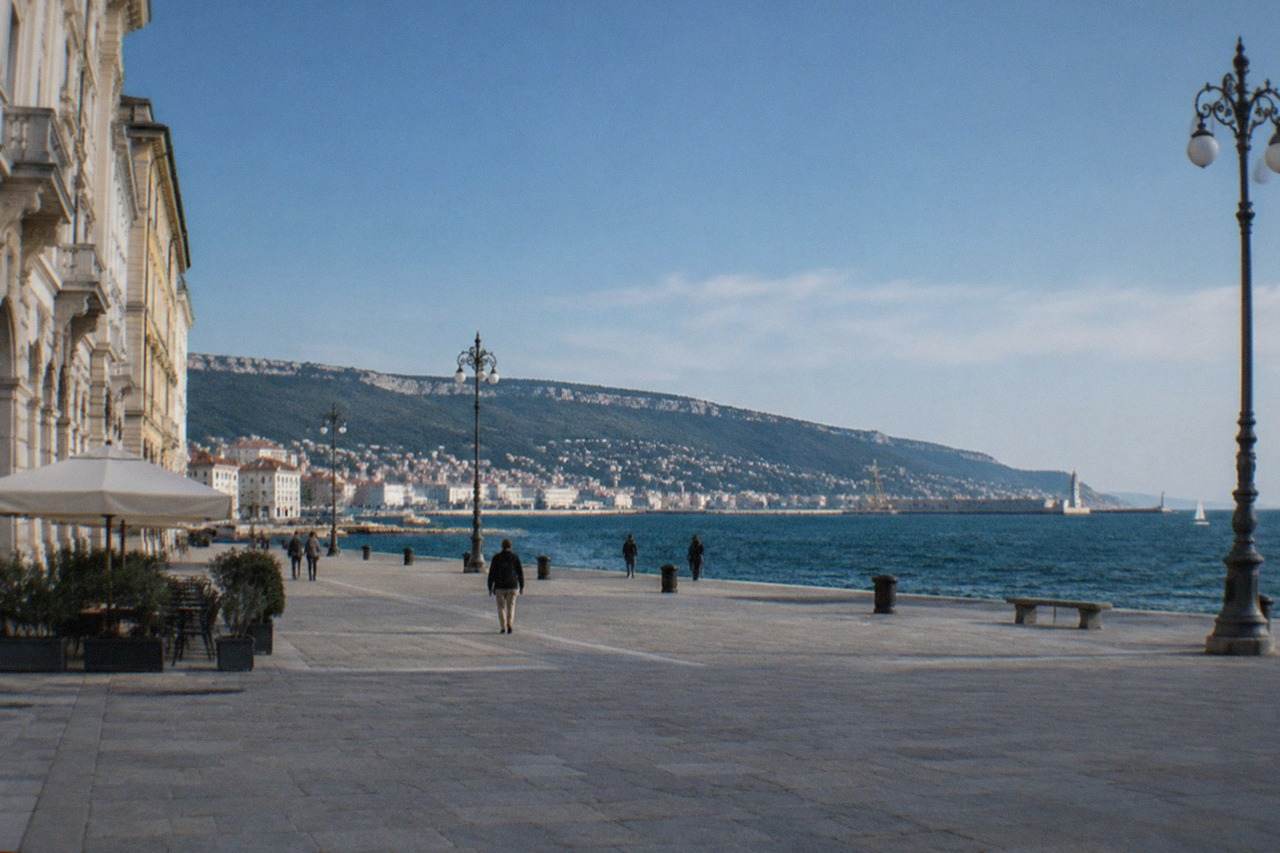 The seafront square of Trieste with the Adriatic behind it on a bright morning