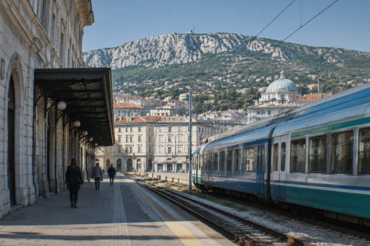 A regional train waiting at Trieste Centrale station platform in Trieste, Italy