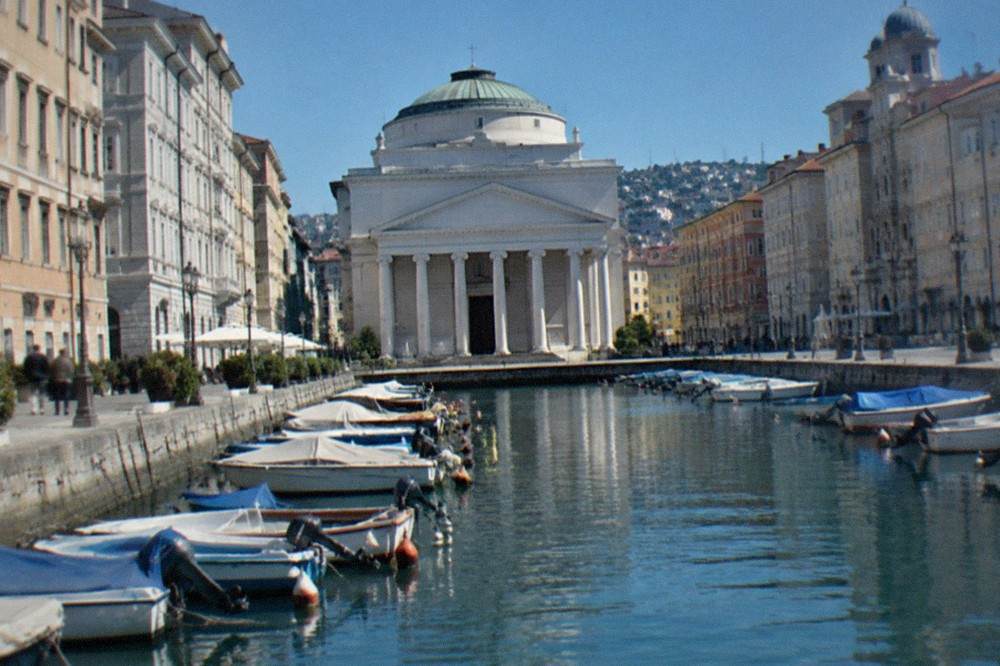The neoclassical church of Sant'Antonio Taumaturgo closing the view at the head of the canal in Trieste