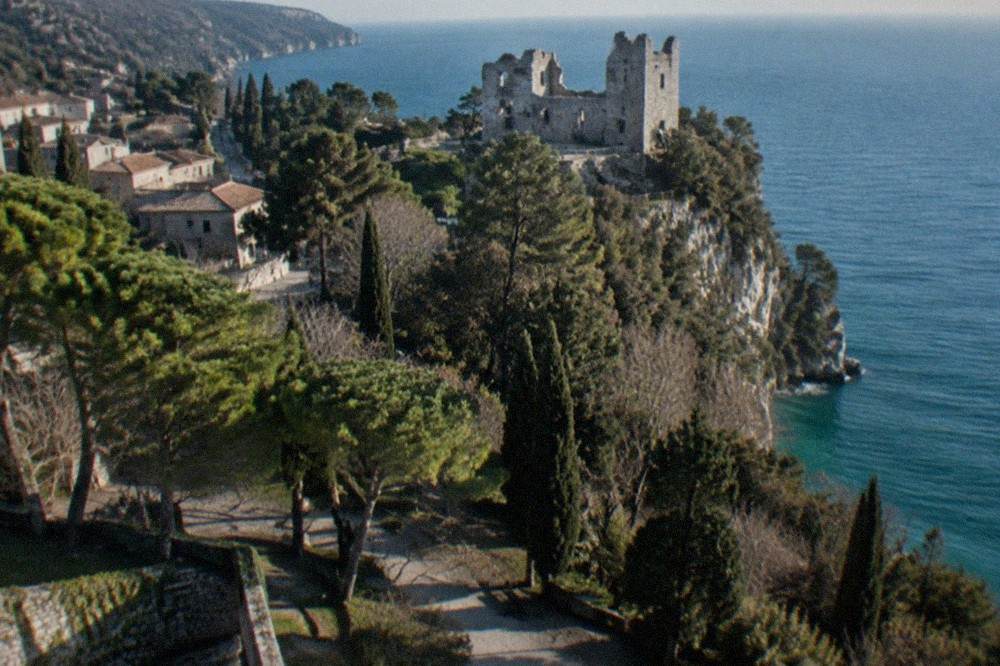The ruined upper castle of Duino seen from the park below