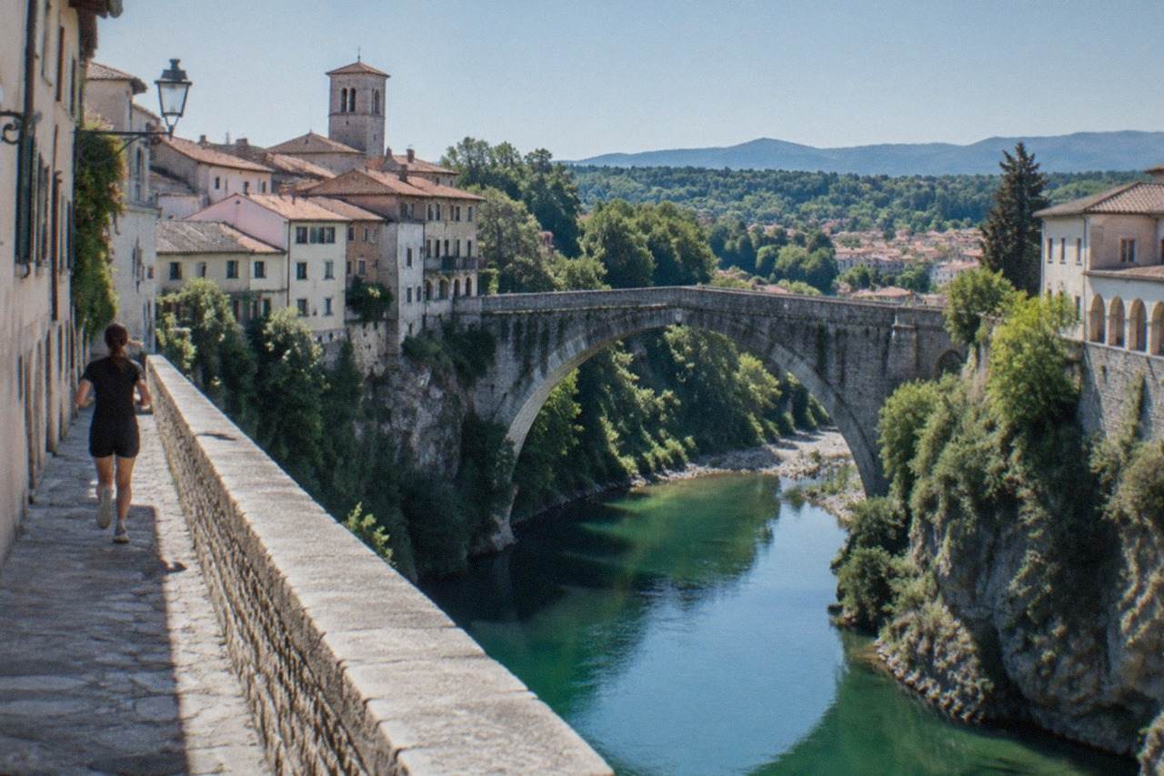 A view over rooftops and a river valley in a small town in the Friuli hills of northern Italy