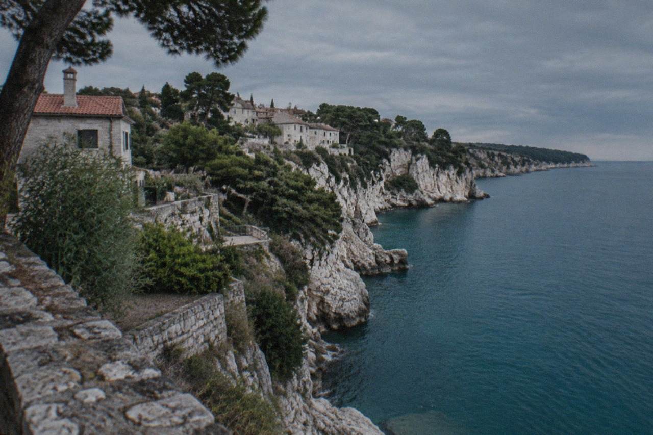 The white limestone cliffs and blue Adriatic water along the coast near Duino north of Trieste