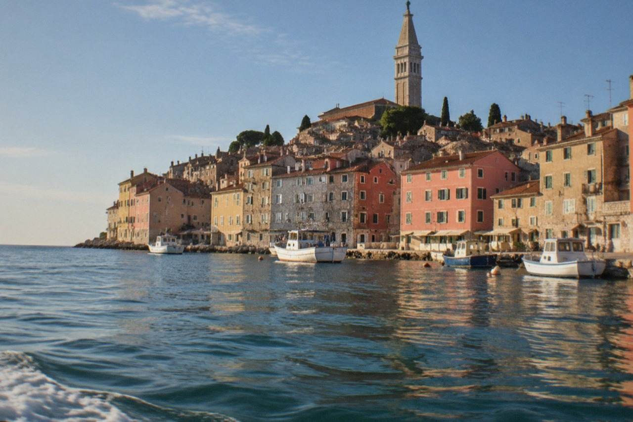 The old town of Rovinj on its headland above the Adriatic, seen from the water