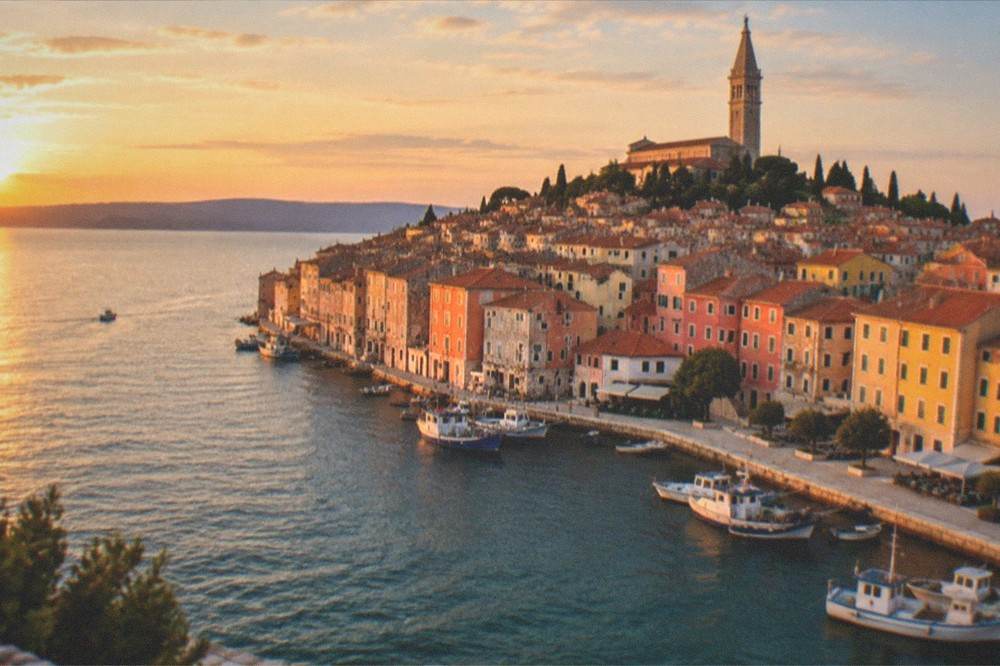 Coastal panorama with Trieste's gulf and hills at golden hour