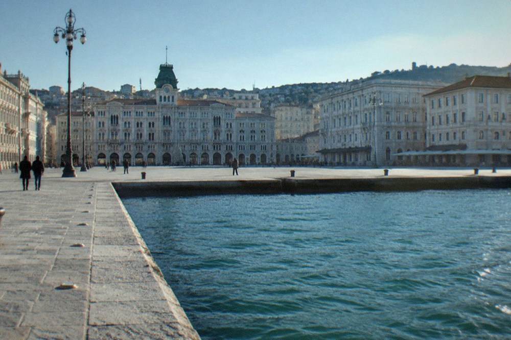 Piazza Unità d'Italia in Trieste seen from the Molo Audace pier on a clear morning