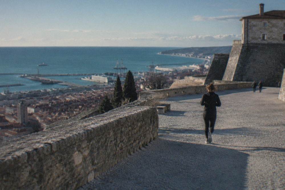 The ramparts of Castello di San Giusto overlooking the rooftops and harbour of Trieste
