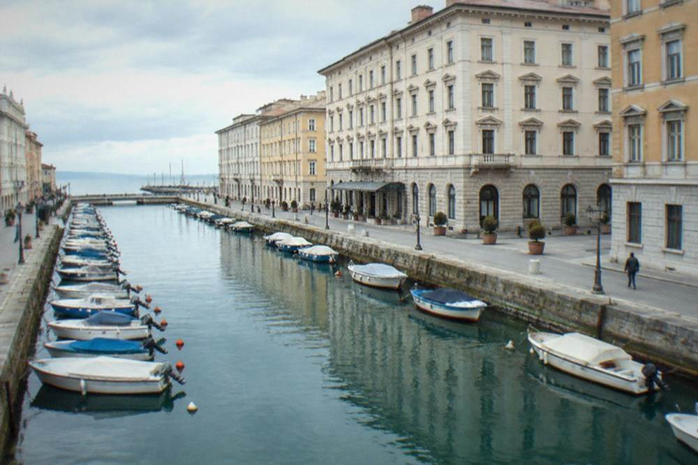A historic hotel facade in central Trieste near the Grand Canal