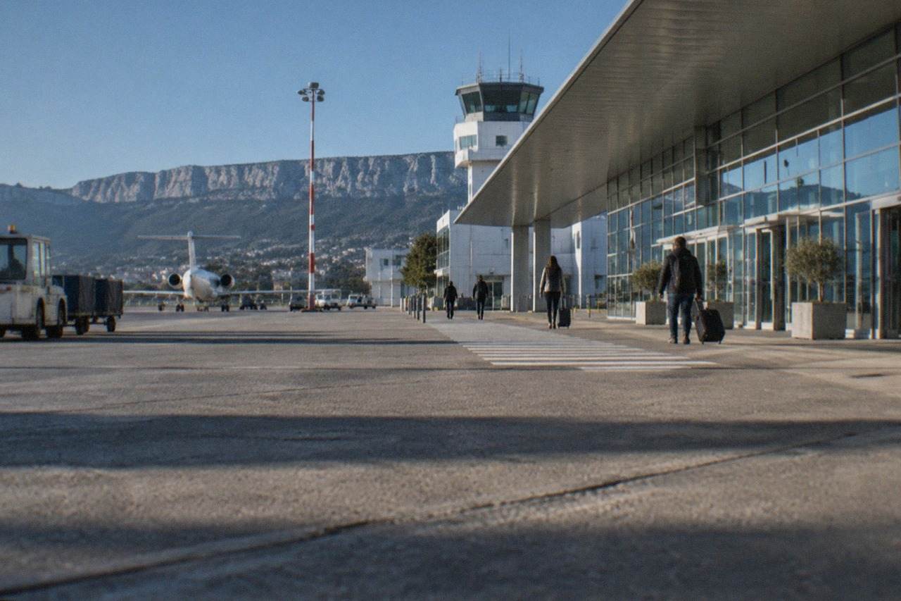 The terminal building of Trieste Airport at Ronchi dei Legionari under a clear sky