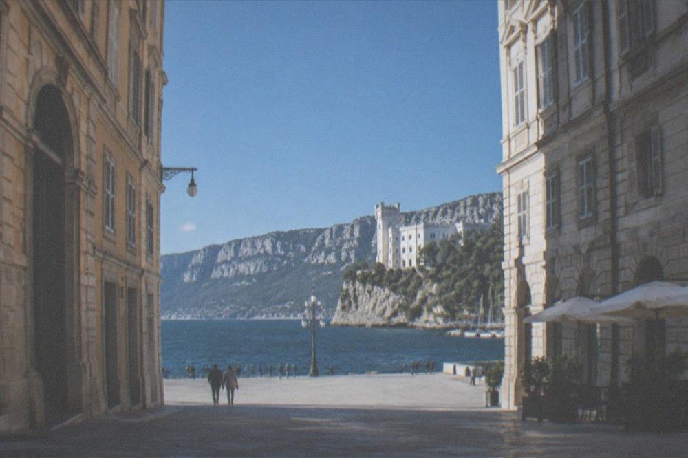A white castle on a headland above the Adriatic coast north of Trieste