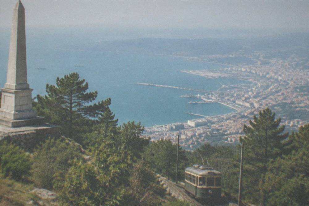 The Opicina tram climbing the Karst slope above Trieste with the gulf below