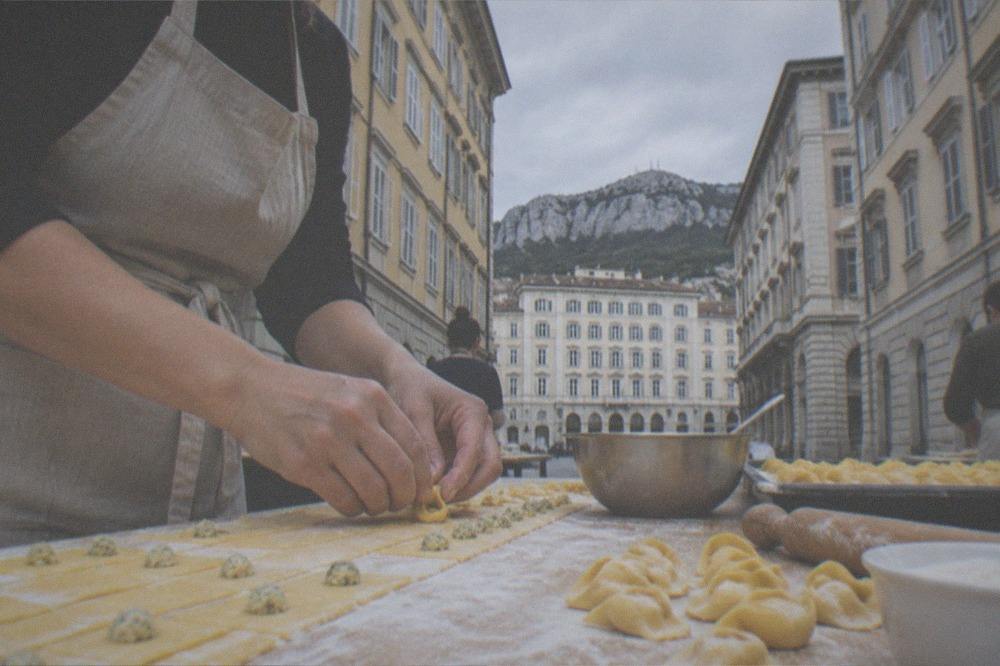 Fresh pasta being prepared by hand during a Trieste cooking class