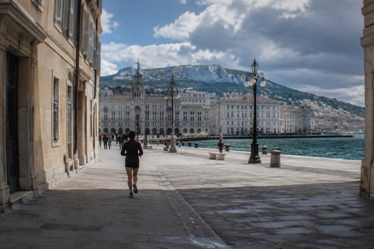 The seafront square of Trieste with grand historic buildings facing the Adriatic