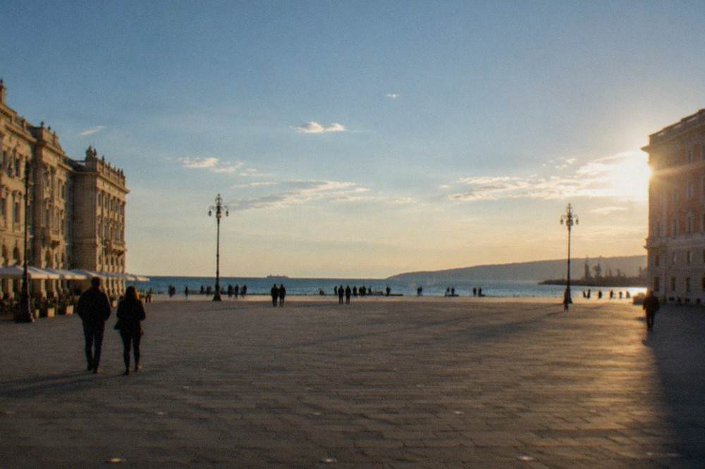 The wide open Piazza Unità d'Italia in Trieste with its grand facades facing the sea